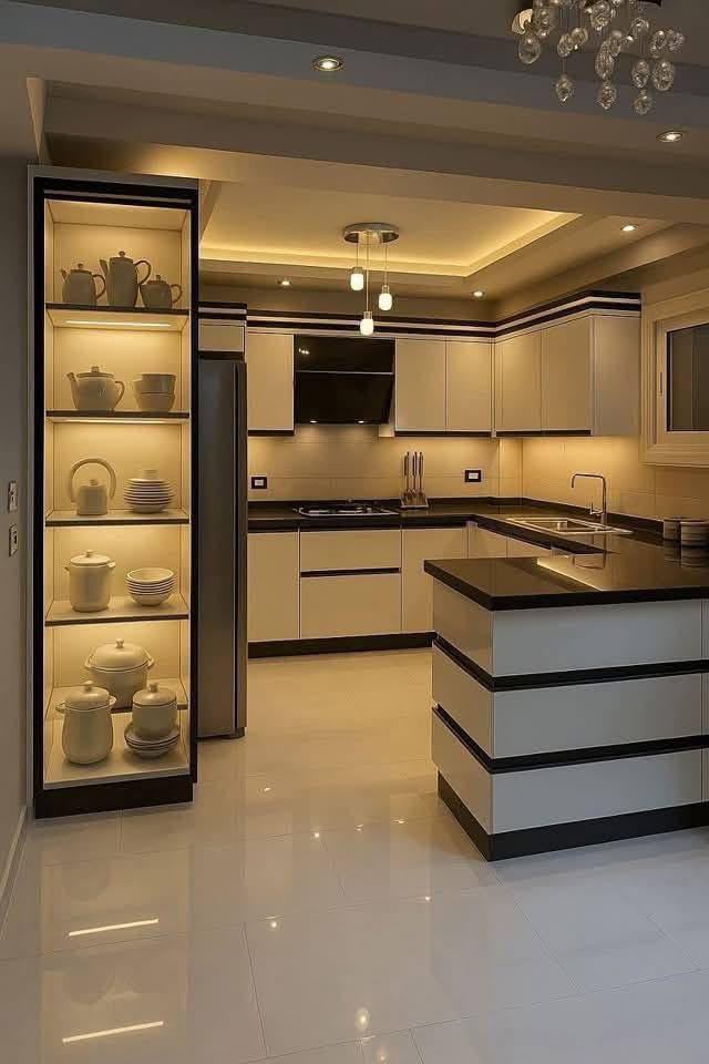 Warm-lit kitchen with illuminated glass display cabinet